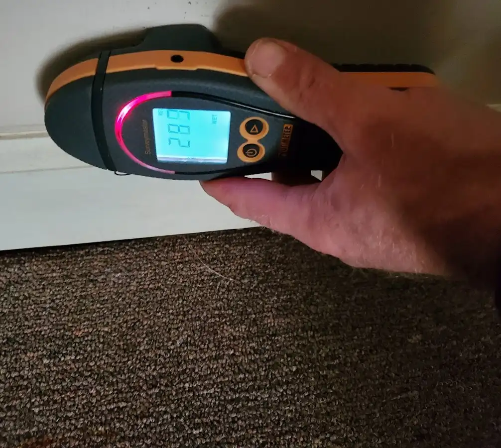 Moisture detection at baseboard during Storm Damage Restoration in Spanish Fork
